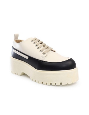 Zapato de plataforma Zapato de plataforma
