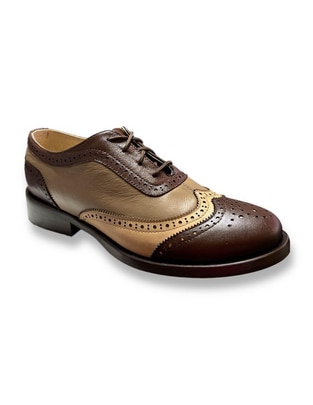 Zapato de piel para mujer