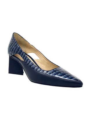 Zapatilla de piel Regina Romero