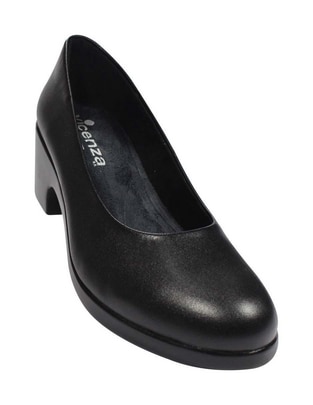 Zapatilla piel 1