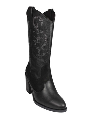 Bota arriba del tobillo de piel para mujer