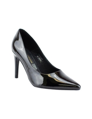 Zapatilla piel