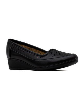 Zapato de piel para mujer