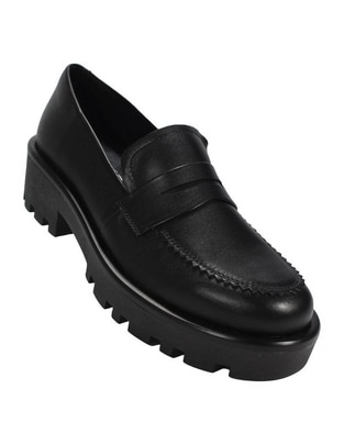 Zapato de piel para mujer