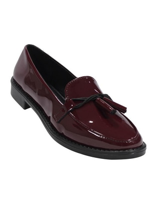 Zapato de charol para mujer
