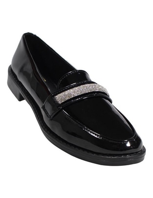 Zapato de charol para mujer