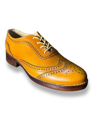 Zapato de piel para mujer
