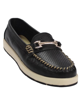 Zapato de piel para mujer