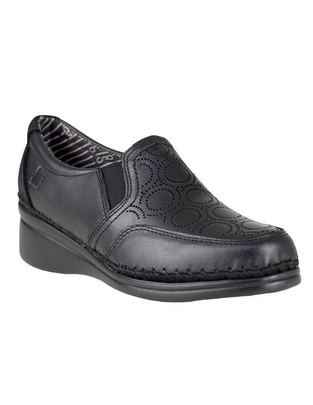Zapato de piel para mujer