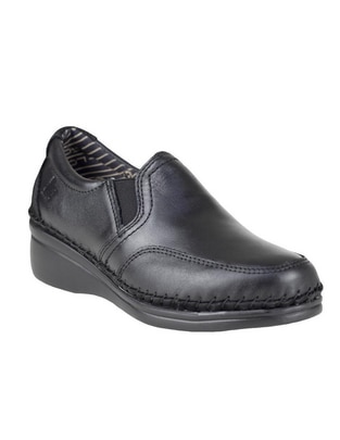 Zapato de piel para mujer