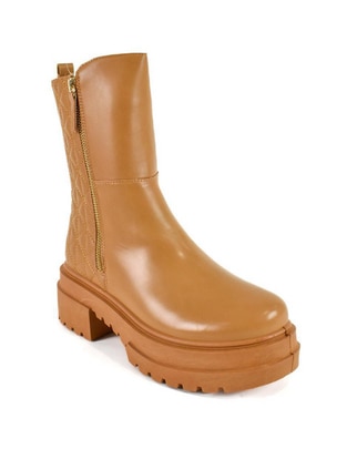 Bota arriba del tobillo para mujer