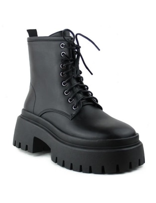 Bota arriba del tobillo para mujer