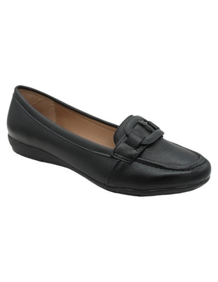 Zapato de piel para mujer