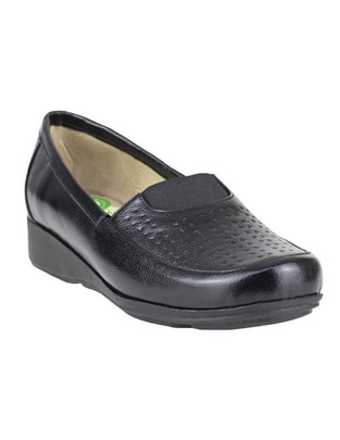 Zapato de piel para mujer