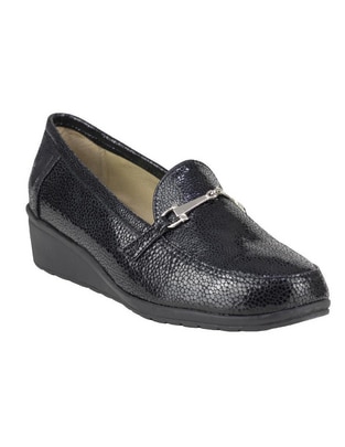 Zapato de piel para mujer