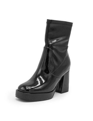 Botín arriba del tobillo para mujer