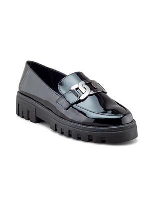 Zapato de charol para mujer