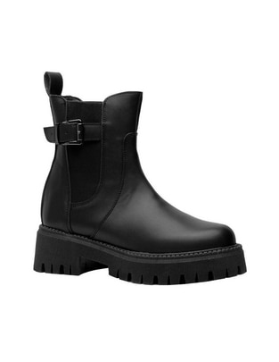 Bota chelsea arriba del tobillo para mujer