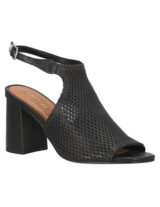Zapatilla piel