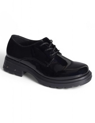 Mocasín de charol para mujer