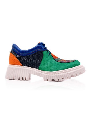 Zapato de piel para mujer