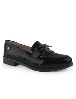 Zapato de charol para mujer
